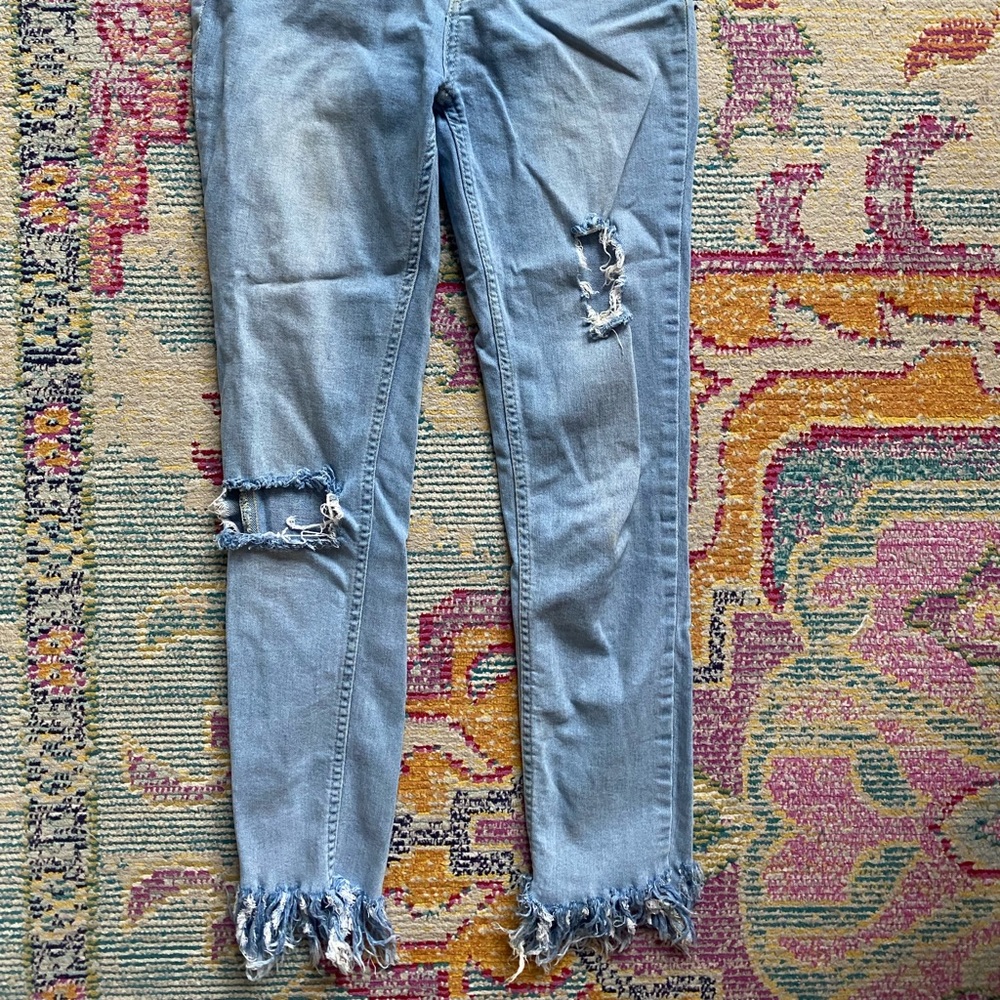 Free people jeans with fringe detailing